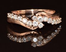 A 9ct rose gold ring set with diamonds, 2.4g, size N