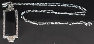 Art Deco silver lorgnette set with marcasite and onyx (5.8cm) on original chain with barrel clasp (