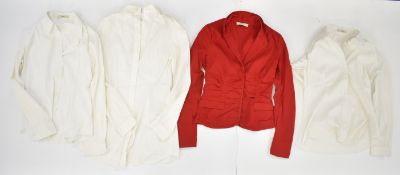 Four ladies Prada shirts/ blouses, three white and one red, three size 42, the other 44.