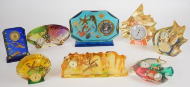 Eight mid-century modern lucite / acrylic barometers set in seal life displays featuring sea horses,
