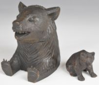 Two Black Forest carved wooden bears, one with hinged head forming an inkwell, taller 8cm