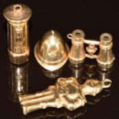 Four 9ct gold charms in the form of a Police hat, post box, binoculars and a knight, 4.5g
