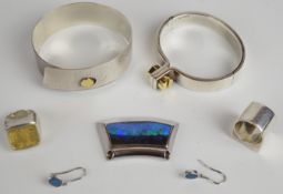 Two bespoke silver bangles with gold details, hallmarked silver ring with gilt decoration, square