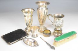 Hallmarked silver items comprising christening mug, salt, trophy cup, napkin ring, pin dish, green