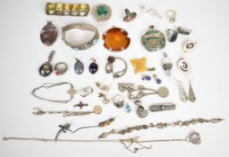 A collection of mainly unmarked white metal jewellery including mother of pearl white metal