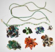 A collection of loose beads, cabochons and gemstones including six briolette cut tourmaline, Blue