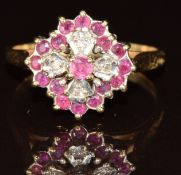A 9ct gold ring set with diamonds and rubies, 2.9g, size P