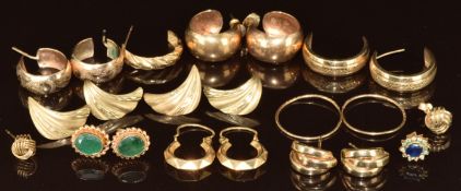 Nine pairs of 9ct gold earrings including hoops, emeralds, etc and four single 9ct gold earrings,