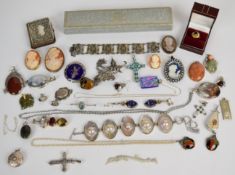 A collection of mainly silver jewellery including six brooches, three set with cameos, bracelet