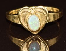 A 9ct gold ring set with an opal in a heart setting, 4.4g, size P