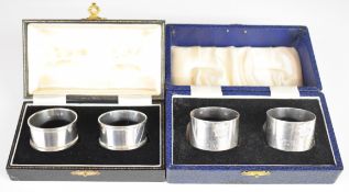 Two cased pairs of hallmarked silver napkin rings, one with Military RASC badge and inscription