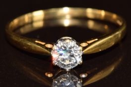 An 18ct gold ring set with a round cut diamond of approximately 0.33ct, 1.8g, size Q