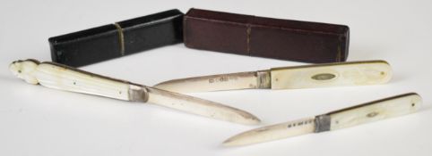Three William IV and Victorian hallmarked silver and mother of pearl folding fruit knives comprising