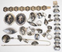 A collection of silver Siam jewellery including five brooches, two rings, two bracelets, four