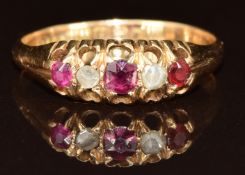An 18ct gold ring set with rose cut diamonds and rubies, Birmingham 1894, 2.4g, size P