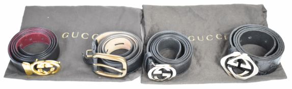 Four Gucci belts, purchased by vendor from Harrods, Harvey Nichols, etc., three with signature GG
