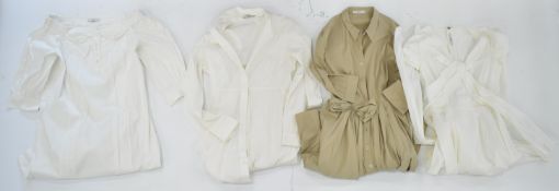 Four Prada cotton dresses, three white and one beige, all size 44