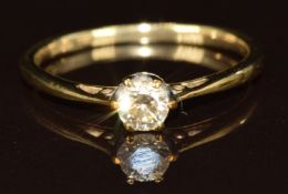 A 9ct gold ring set with a round cut diamond of approximately 0.2ct, 1.3g, size M