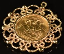 1965 gold full sovereign in 9ct gold mount, 13.3g