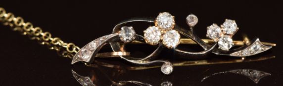 Victorian 18ct gold and silver clover brooch set with old and rose cut diamonds, the total diamond