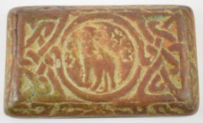 Tiffany Studios, New York bronze Capricorn Zodiac paperweight with relief moulded decoration, 5.5