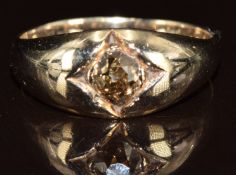 A 9ct gold ring set with a brown old cut diamond of approximately 0.5ct, 3.6g, size M