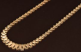 A 9ct gold necklace made up of textured and smooth rectangular links, 13.8g, 40cm