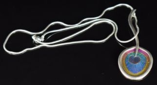 A silver pendant set with multi coloured niobium (6.5cm) on silver snake chain, made by James B