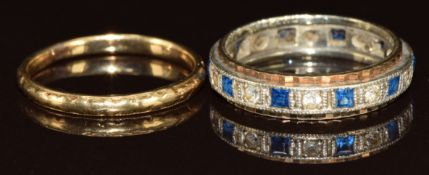 A 9ct gold wedding band / ring (size O) and a 9ct gold eternity ring, size O, 5.2g