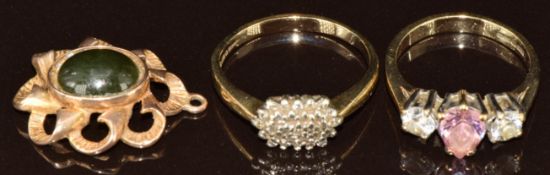 A 9ct gold ring set with diamonds (2.3g, size N), a 9ct gold ring set with cubic zirconia (2.6g,