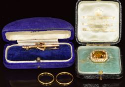 A 9ct gold brooch set with a citrine surrounded by pearls by Murrle Bennet, in antique box (3.3g), a