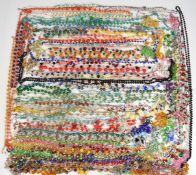 A large collection of Art Deco crystal and glass beaded necklaces