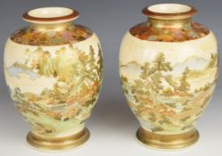 A pair of Japanese late 19th/ early 20thC Satsuma vases each decorated with figures crossing a