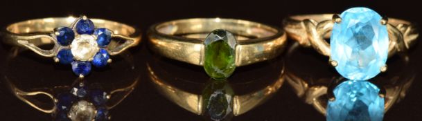 Three 9ct gold rings, one set with a topaz, one a tourmaline and the other spinel, 5.9g, size P, O &