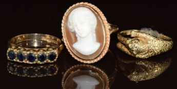 Three 9ct gold rings, one set with a cameo, one sapphires and the other in the form of a leopard,