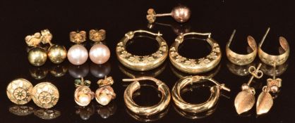 Eight pairs of 9ct gold earrings incudling hoops, one pair set with pearls, one pair faux pearls,
