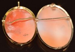 An 18ct gold brooch / pendant set with a cameo depicting a young woman (6.5g, 3 x 3.5cm) and a