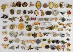 A collection of vintage brooches including Mizpah silver plated, Sphinx, cameo, silver set with