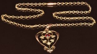 Edwardian 9ct gold pendant set with a garnet and seed pearls (4.2cm) on 9ct gold chain with barrel