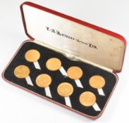Cased set of eight gold full sovereigns comprising 1868 Queen Victoria with young head, shield