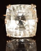 A 9ct gold ring set with a mixed cushion cut pale pink sapphire of approximately 25ct, 9.9g, size L