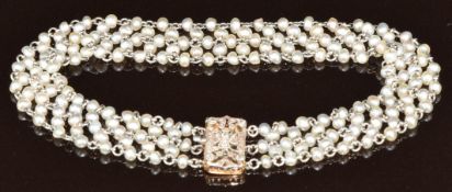 Belle Époque 9ct white gold bracelet set with natural pearls and with old and rose cut diamonds to