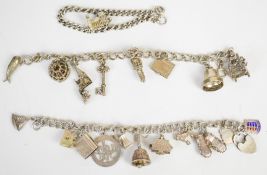 Three silver charm bracelets with twenty charms including camera Stanhope, bible, 'I love you',