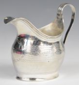 Georgian hallmarked silver milk jug with bright cut decoration, London 1806, maker Samuel Godbehere,