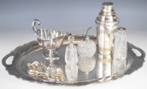 Three silver mounted glass bottles including two hallmarked, the atomiser marked sterling, a
