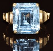 A 9ct gold ring set with an emerald cut synthetic spinel, 7.4g, size Q