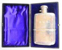 Edward VII cased hallmarked silver spirit or hip flask with pull off cup and hinged bayonet cap,