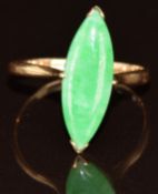 An 18k gold ring wet with a marquise jadeite cabochon, 2.1g, size L