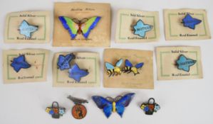Thirteen silver and enamel brooches including seven 'mother', two butterflies, two bees, two in