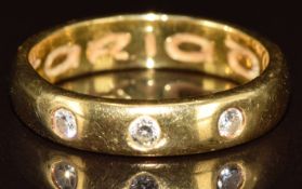 Clogau 18ct gold ring set with three diamonds, 4.9g, size M